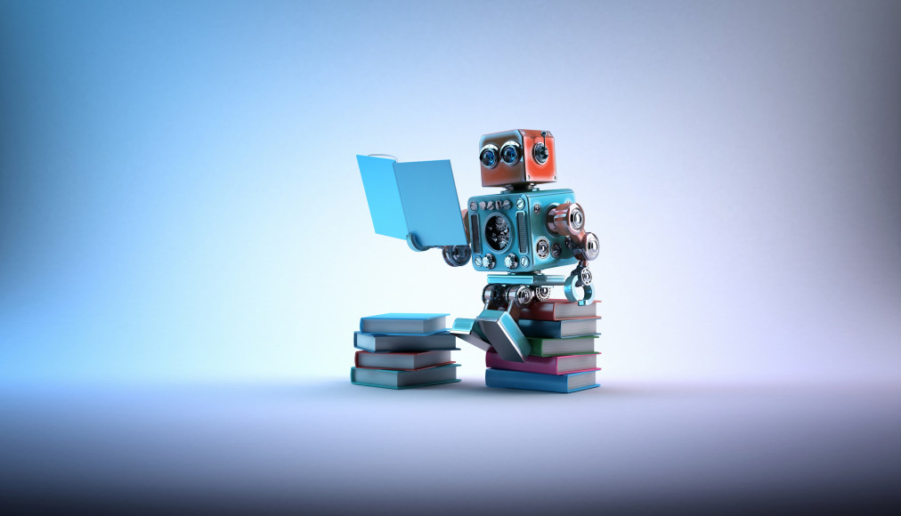 Un robot en pleine lecture. Un exemple de deep learning? / ©iStock / Kirillm
